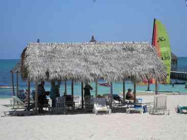 Santa Lucia (Camaguey) palm tree sailboat beach