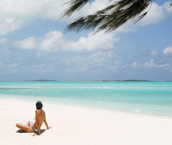 Great Exuma girl on the beach