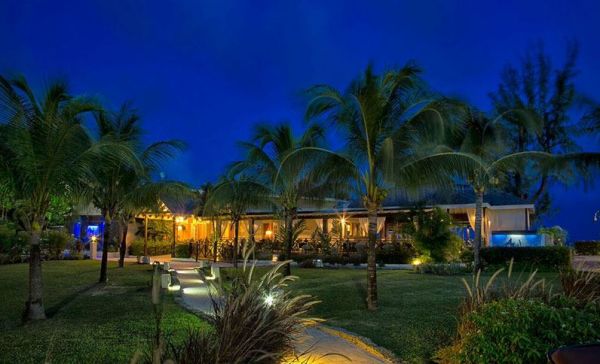 Sea Breeze Beach Hotel exterior at night