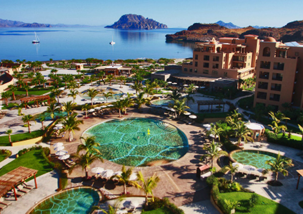 Villa Del Palmar Resort and Spa exterior at night