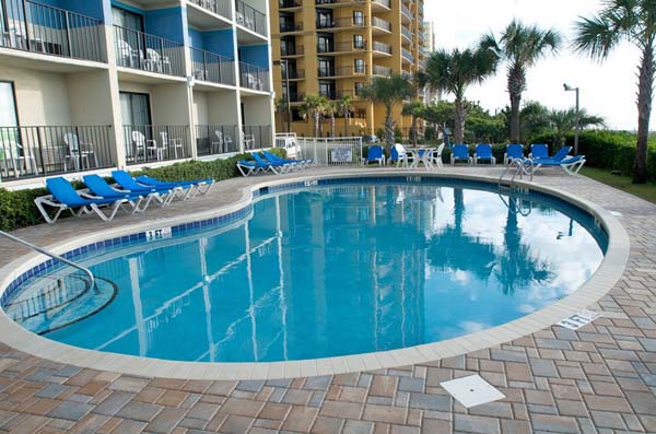 Bw Carolinian Oceanfront Inn and Suites exterior at night