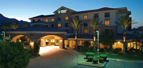 Embassy Suites Quint exterior at night