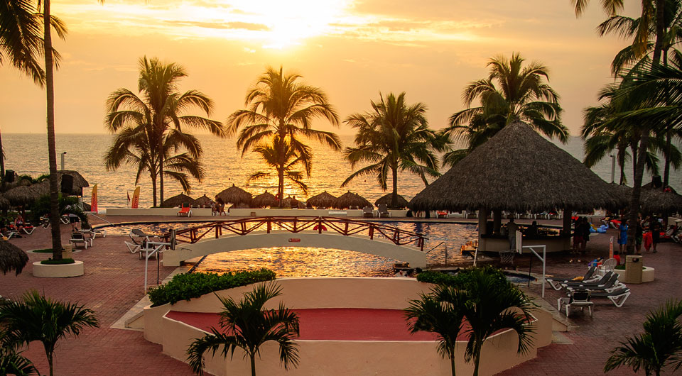 Grand Marival And Suites pool sunset