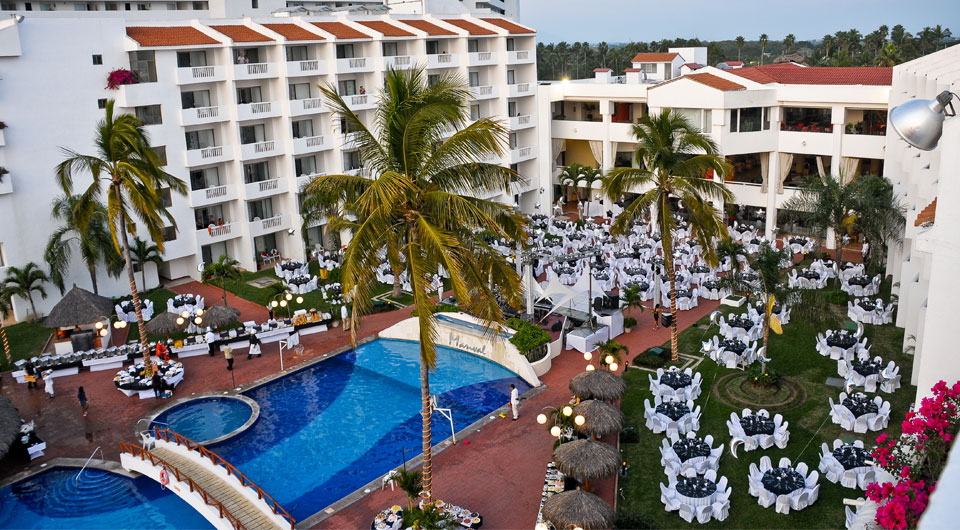 Grand Marival And Suites pool sunset