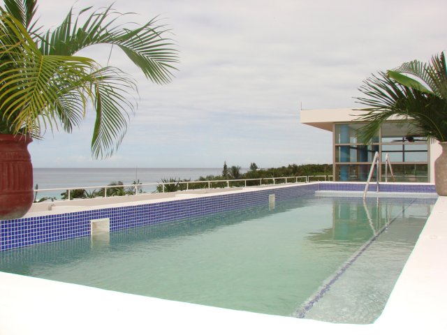 Paradise Oceanic Hotel exterior at night